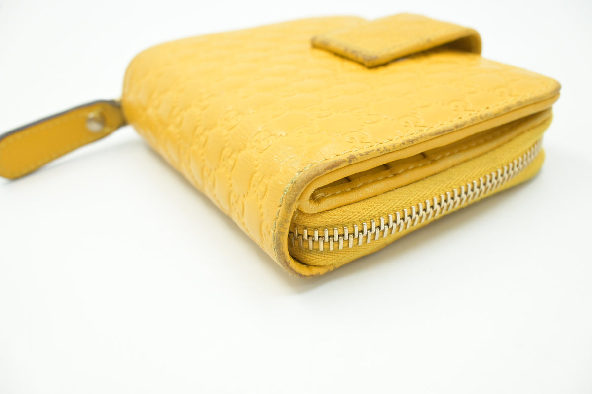 Gucci Compact Wallet in Yellow Microguccissima Leather