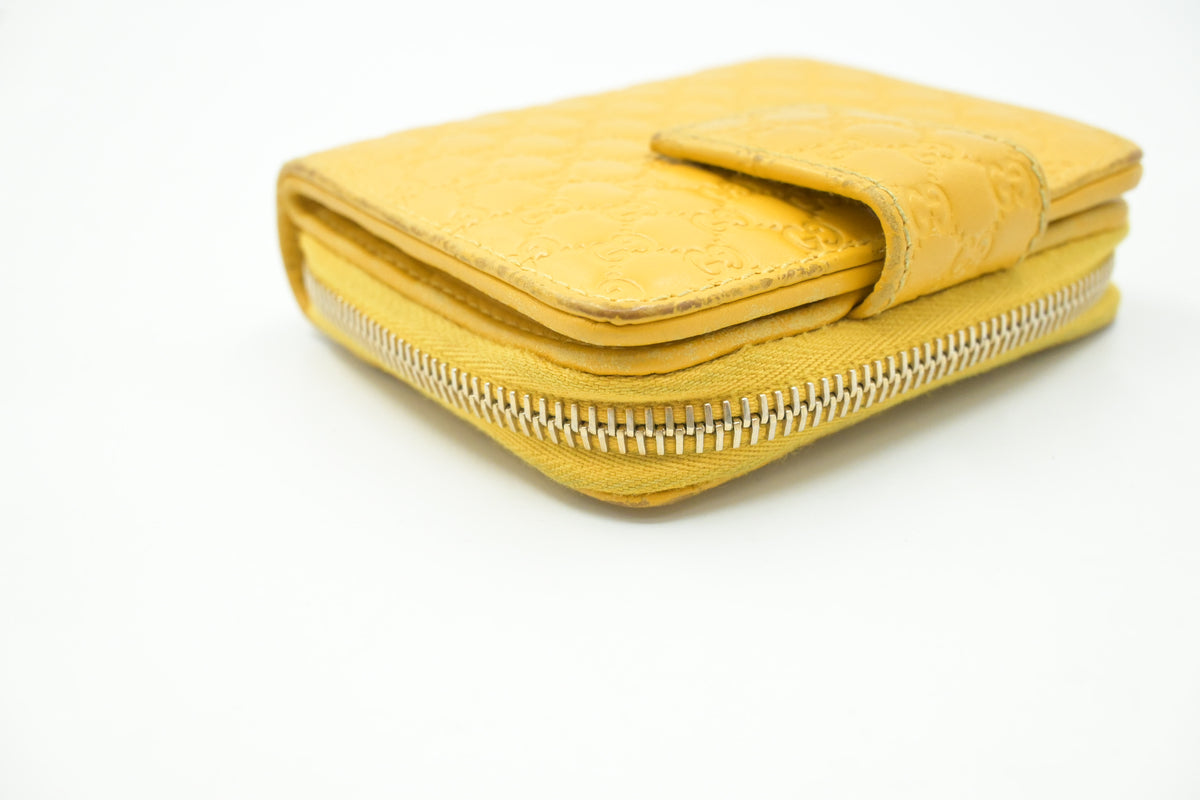 Gucci Compact Wallet in Yellow Microguccissima Leather