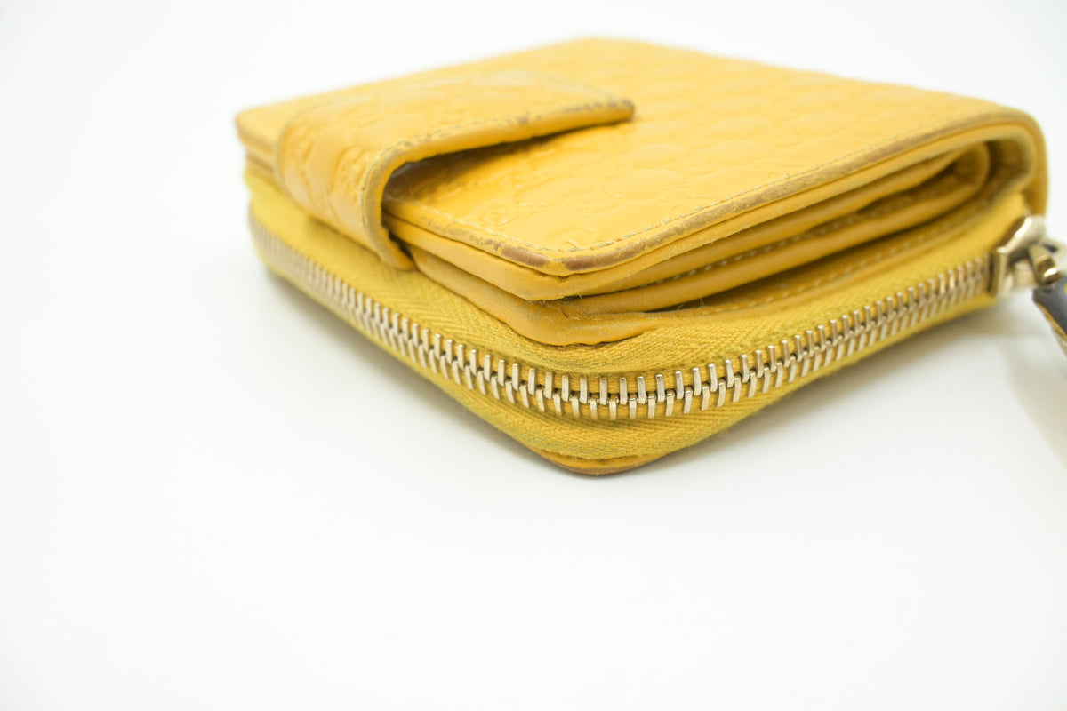 Gucci Compact Wallet in Yellow Microguccissima Leather