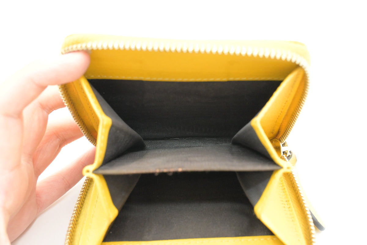 Gucci Compact Wallet in Yellow Microguccissima Leather