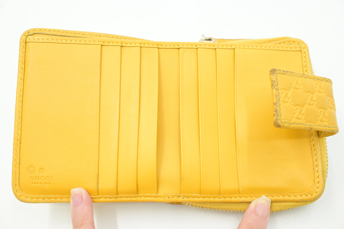 Gucci Compact Wallet in Yellow Microguccissima Leather