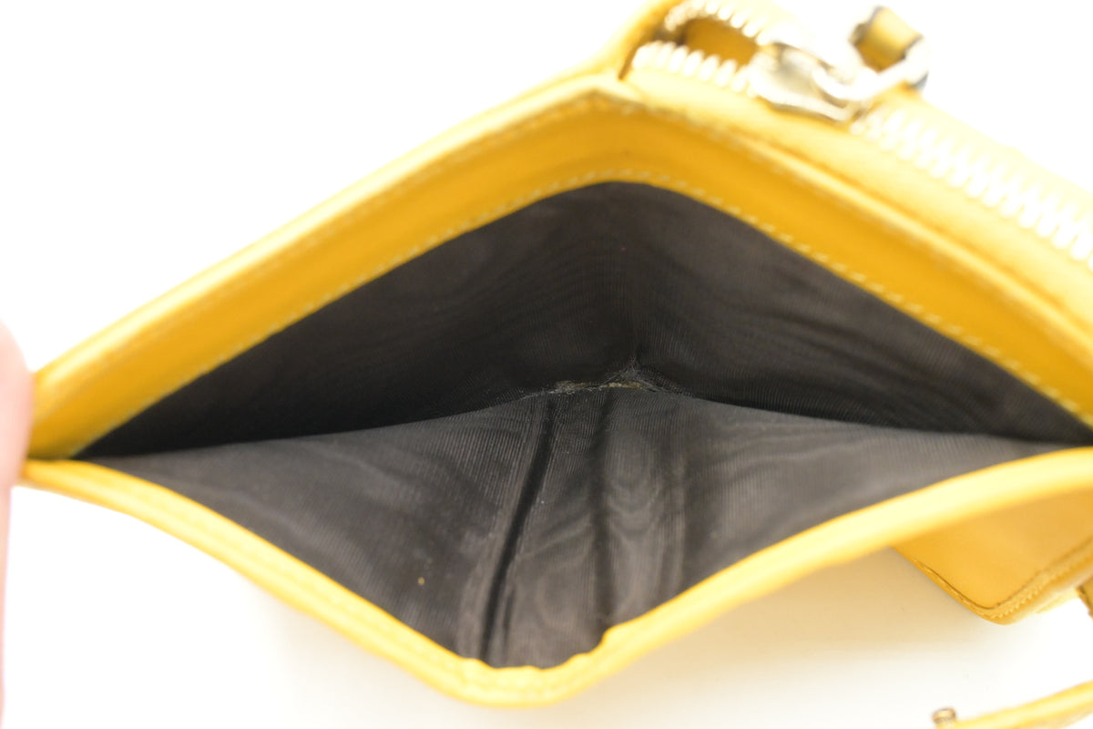 Gucci Compact Wallet in Yellow Microguccissima Leather