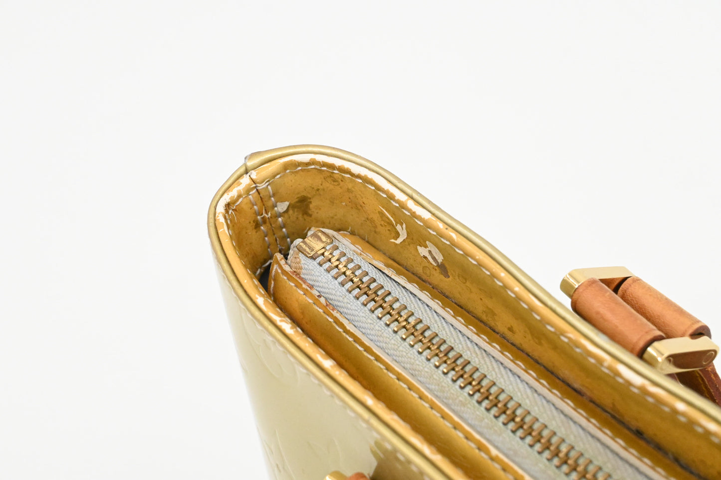 Louis Vuitton Houston in Light Green Vernis Leather