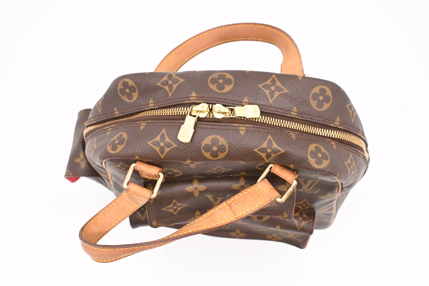 Louis Vuitton Excentri Cite in Monogram Canvas