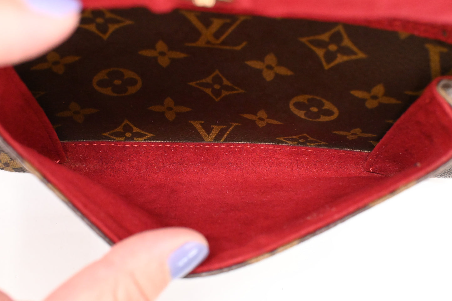 Louis Vuitton Excentri Cite in Monogram Canvas