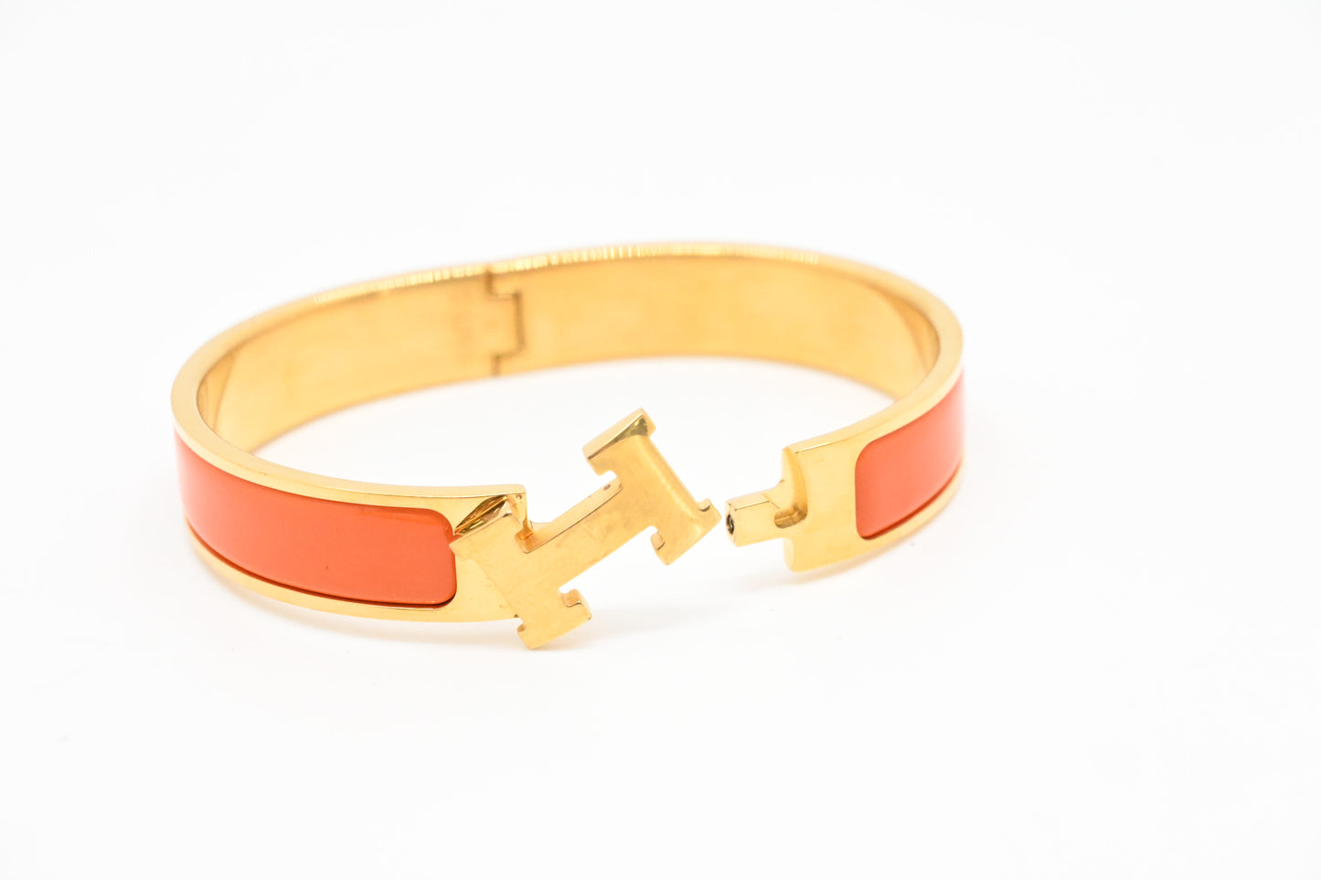 Hermes Clic H Bracelet in Orange Enamel