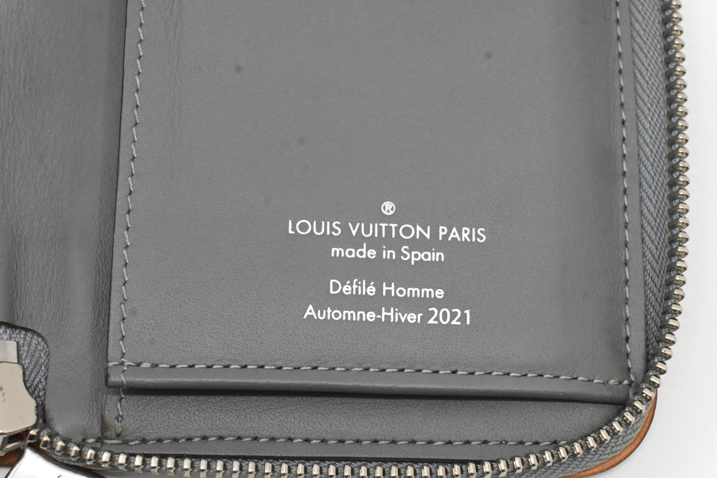 Louis Vuitton Vertical Zippy Wallet in Silver Mirror Canvas