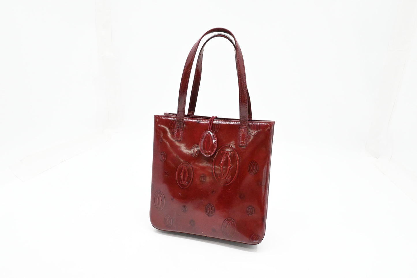 Cartier Handbag in Burgundy Patent Leather
