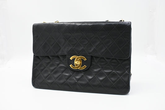 Chanel Maxi Flap in Black Mattelassé Leather