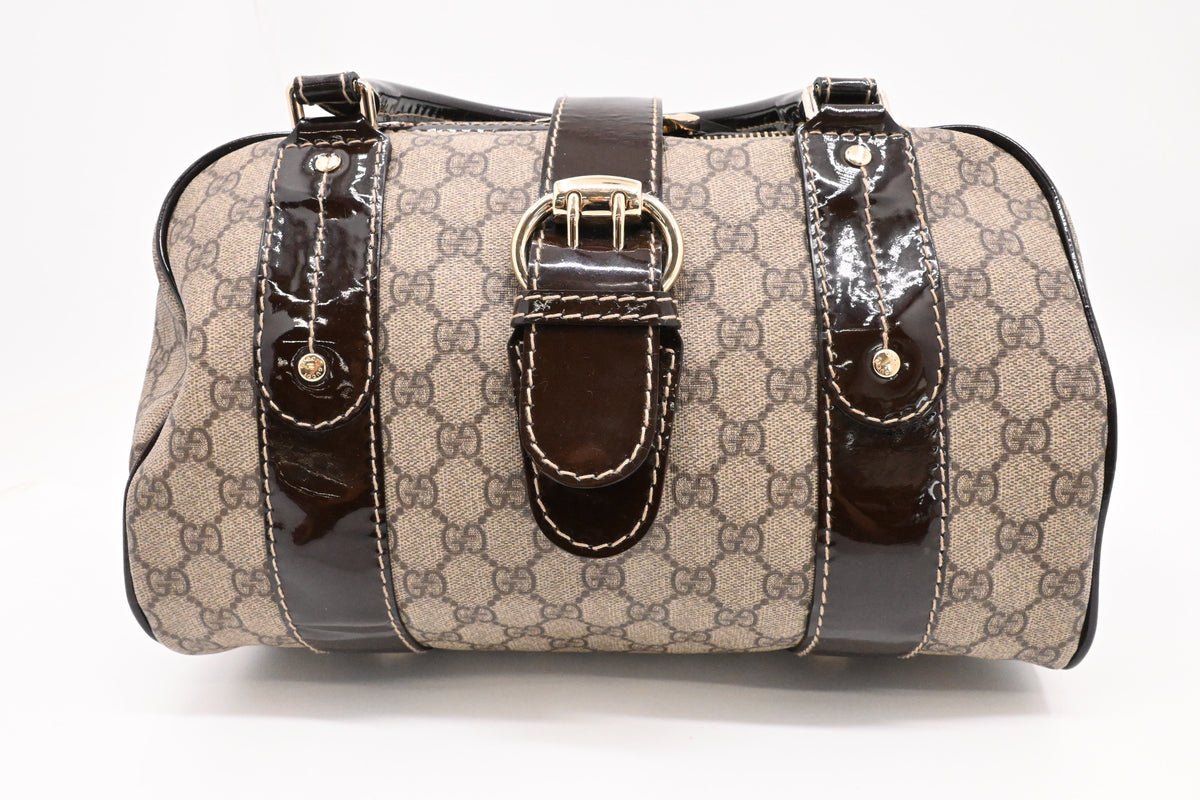 Gucci Boston Bag in GG Supreme Canvas and Brown Patent Leather
