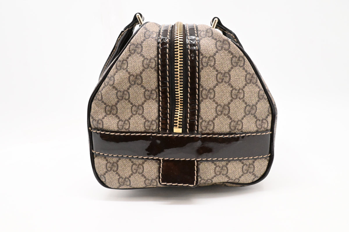 Gucci Boston Bag in GG Supreme Canvas and Brown Patent Leather