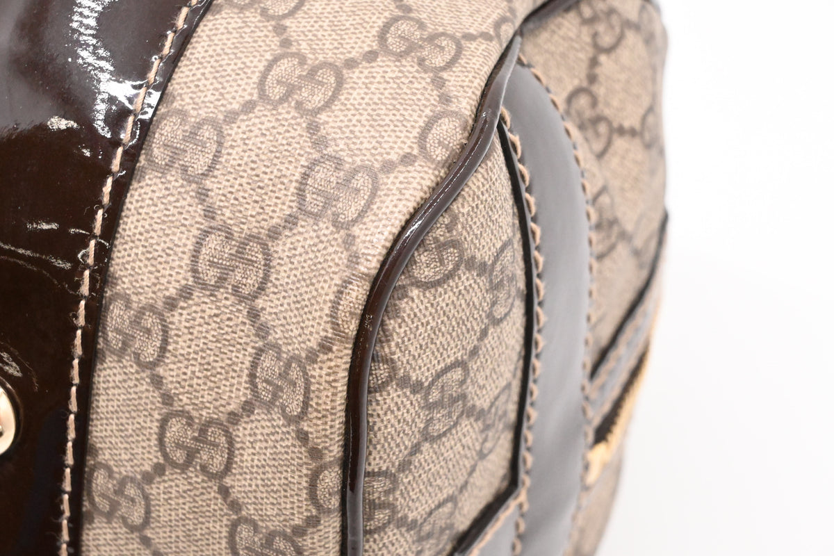 Gucci Boston Bag in GG Supreme Canvas and Brown Patent Leather