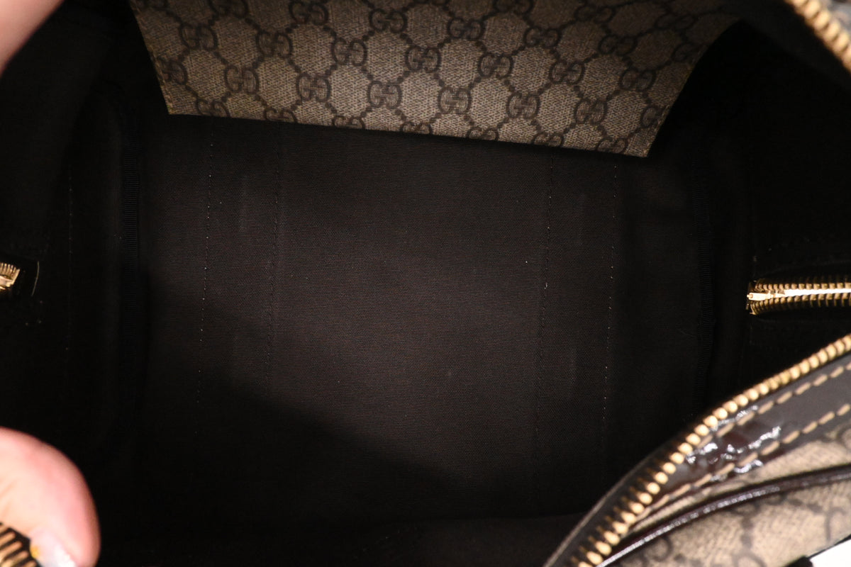Gucci Boston Bag in GG Supreme Canvas and Brown Patent Leather