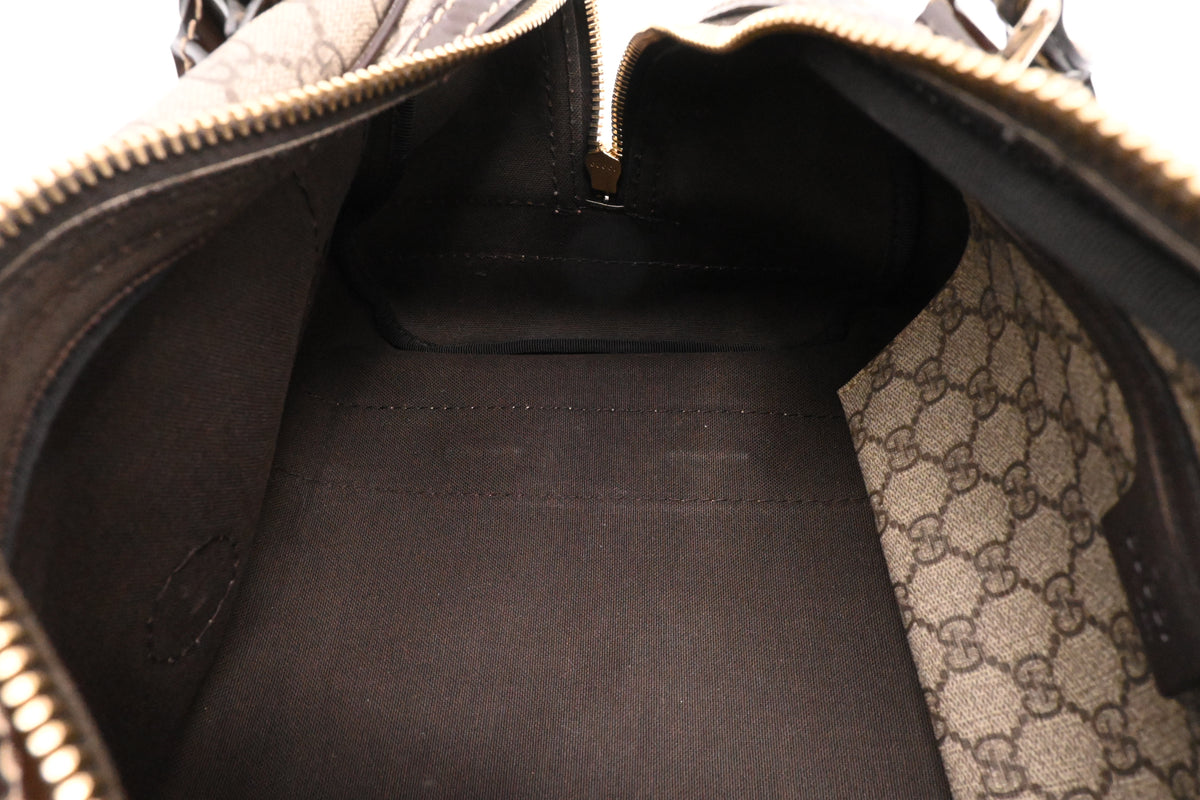Gucci Boston Bag in GG Supreme Canvas and Brown Patent Leather
