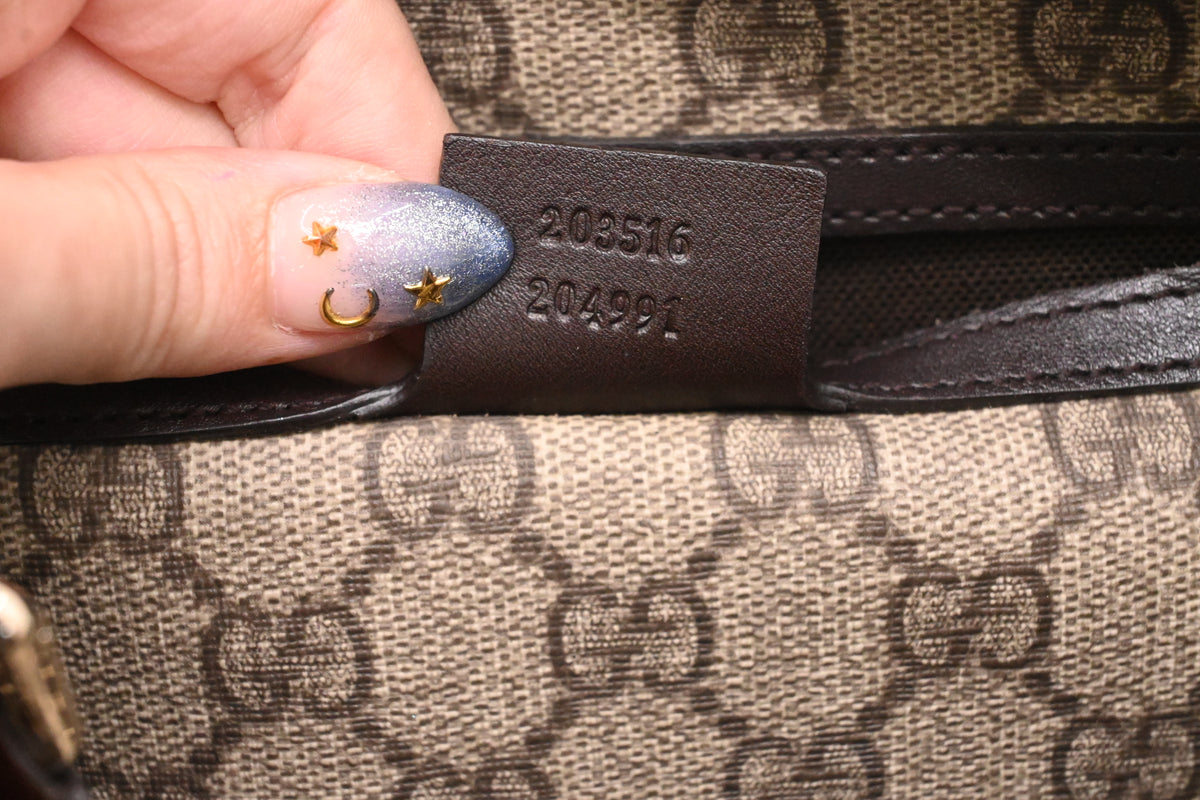 Gucci Boston Bag in GG Supreme Canvas and Brown Patent Leather