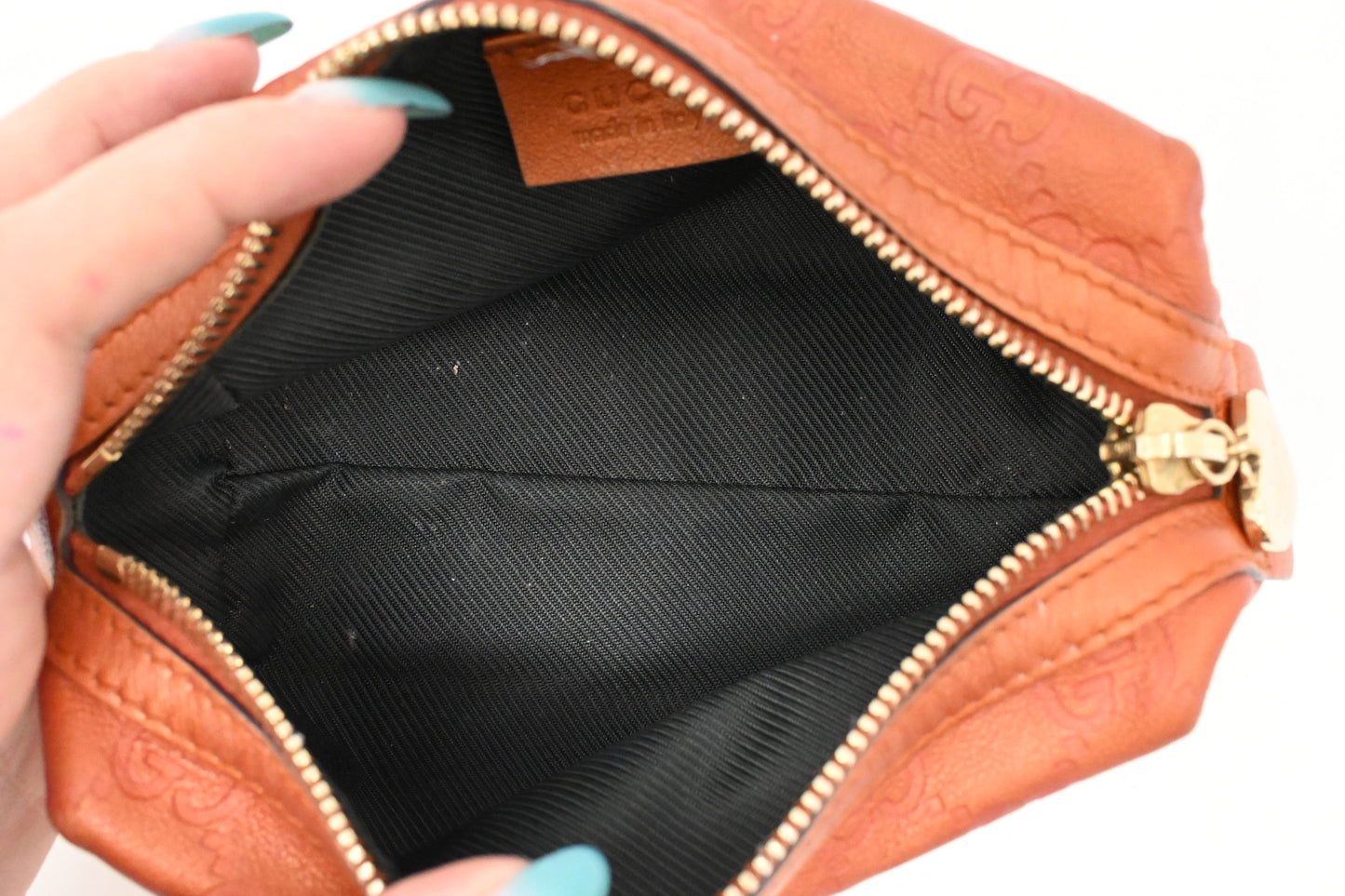 Gucci Pouch in Metallic Orange Guccissima Leather
