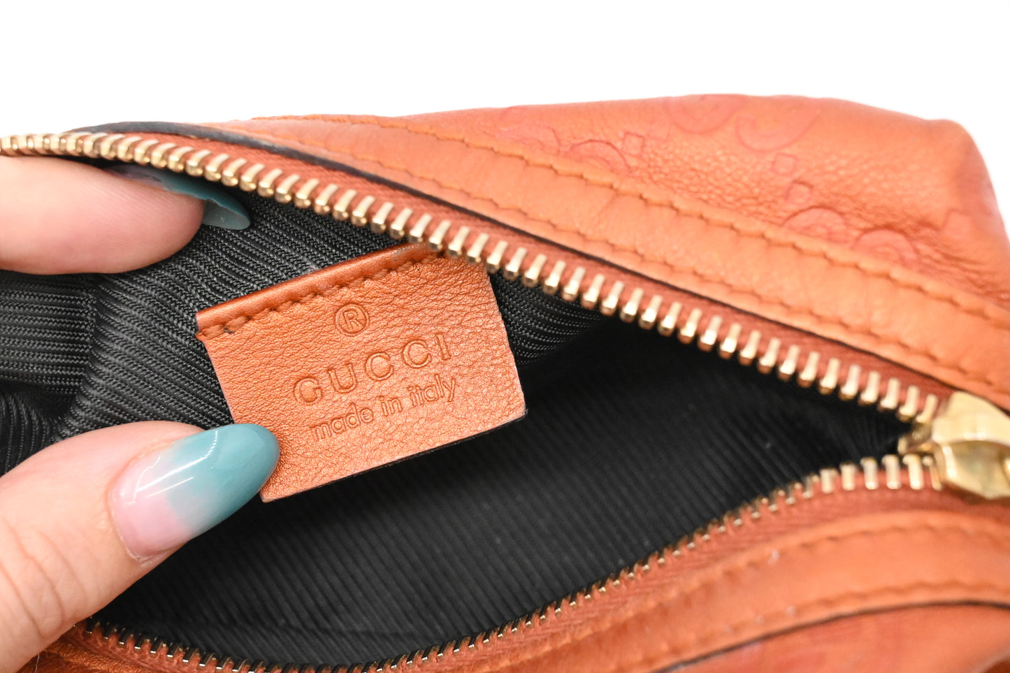 Gucci Pouch in Metallic Orange Guccissima Leather