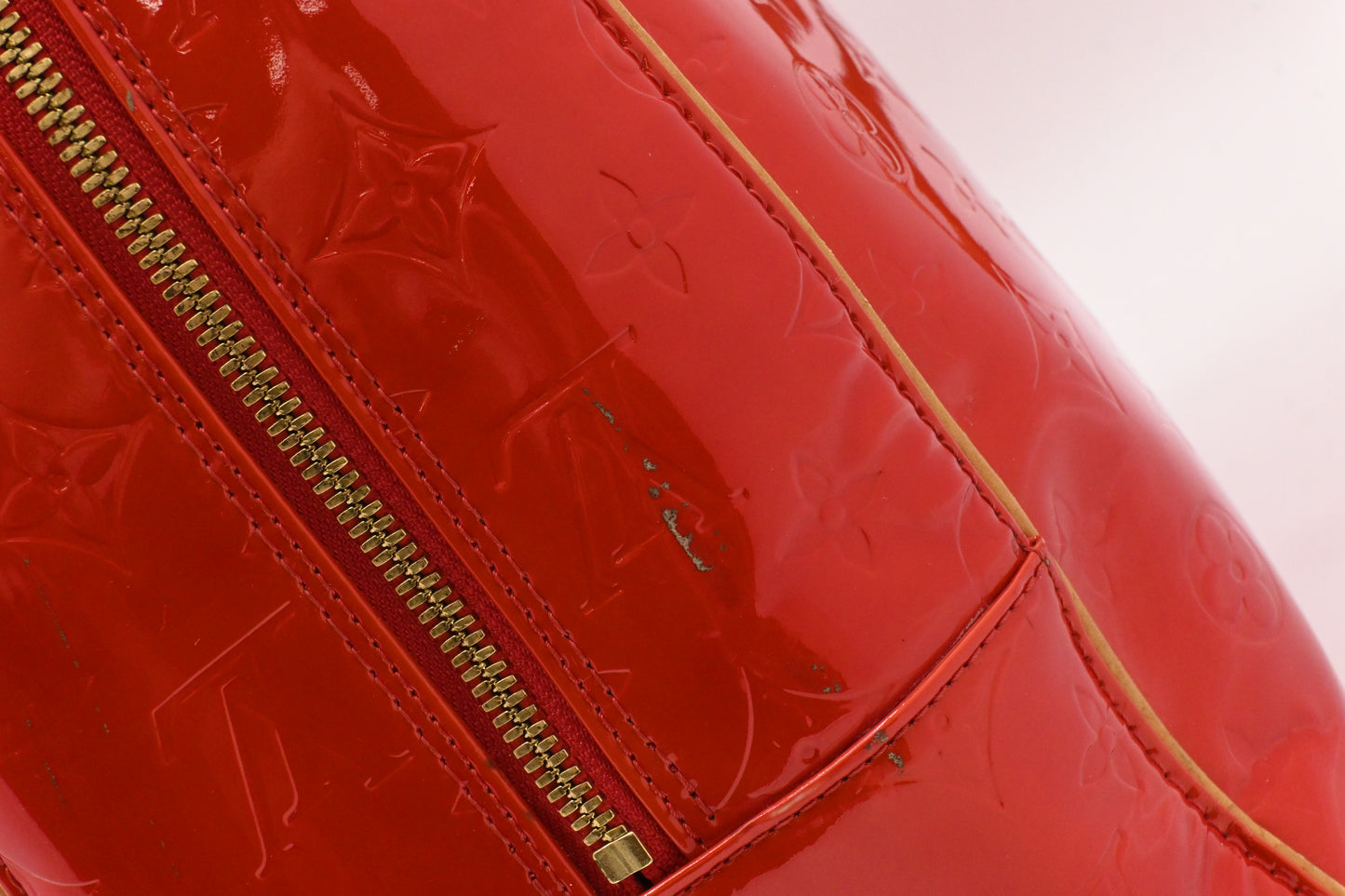 Louis Vuitton Sutton in Red Vernis Leather