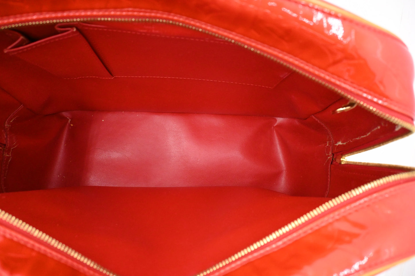 Louis Vuitton Sutton in Red Vernis Leather