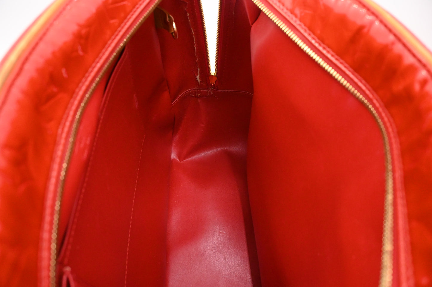 Louis Vuitton Sutton in Red Vernis Leather