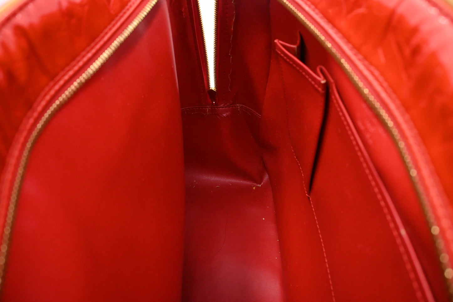 Louis Vuitton Sutton in Red Vernis Leather