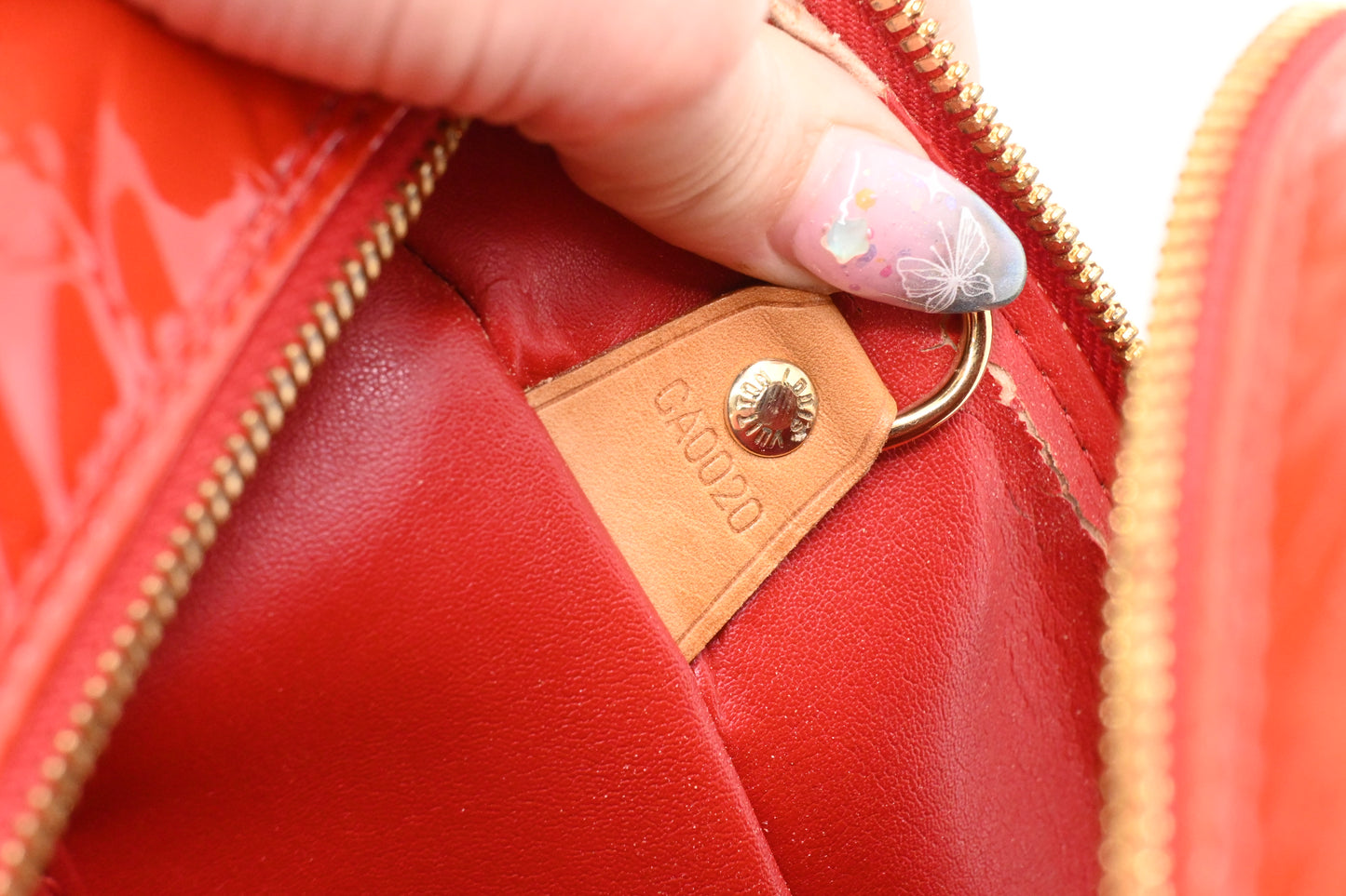 Louis Vuitton Sutton in Red Vernis Leather