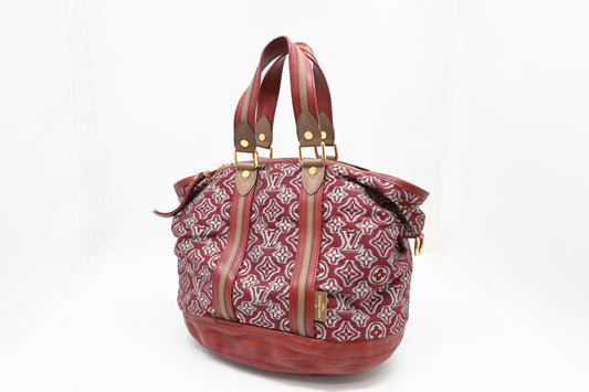 Louis Vuitton Limited Edition Aviator in Red and Silver Jacquard Canvas