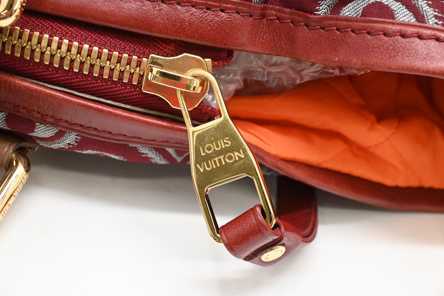 Louis Vuitton Limited Edition Aviator in Red and Silver Jacquard Canvas