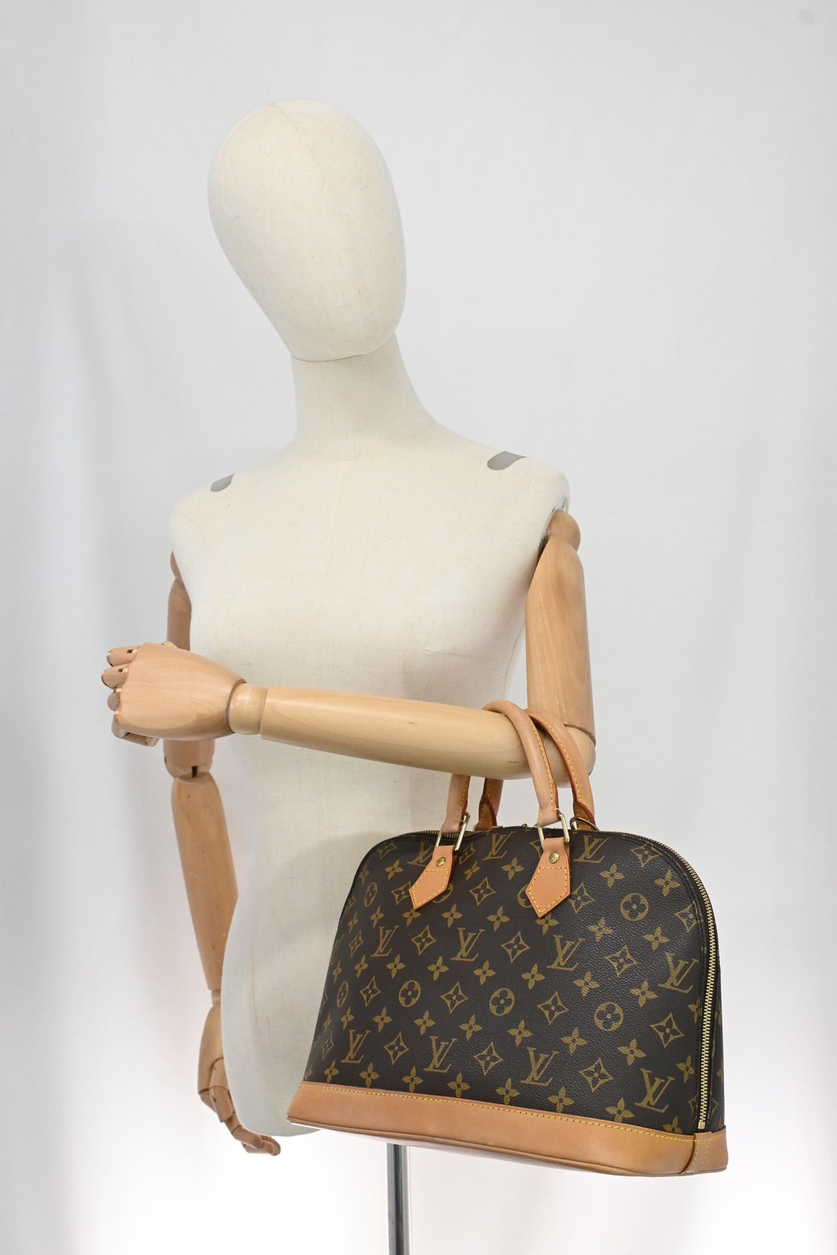 Louis Vuitton Alma PM in Monogram Canvas