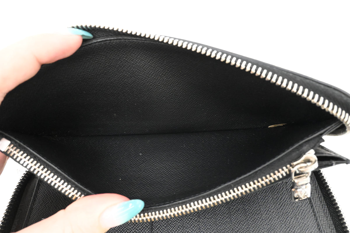 Louis Vuitton Long Zippy Wallet in Black Taiga Leather