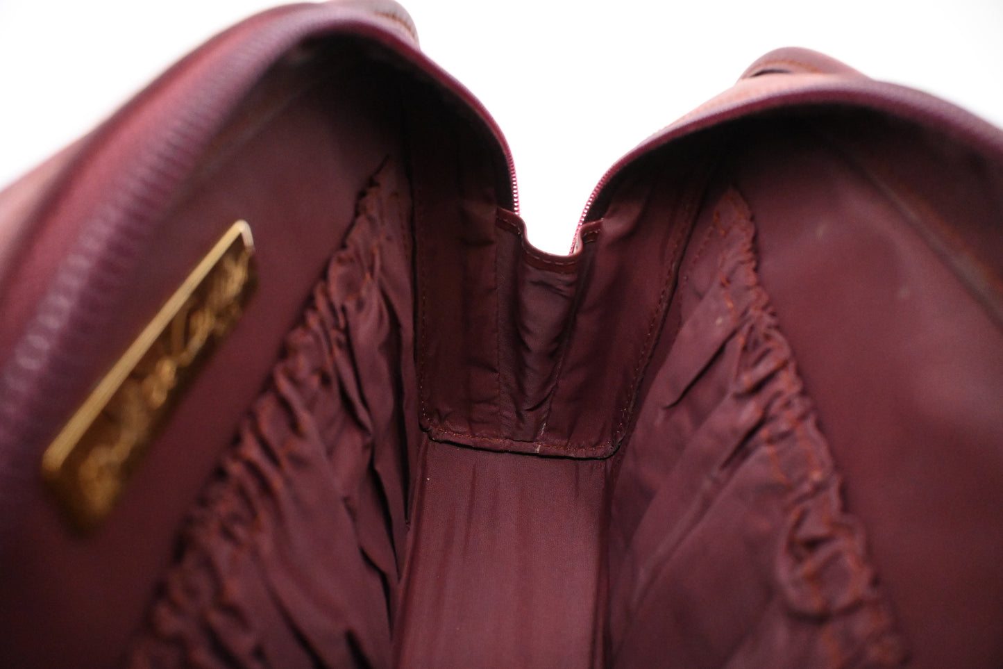 Cartier Toiletry Pouch in Burgundy Leather