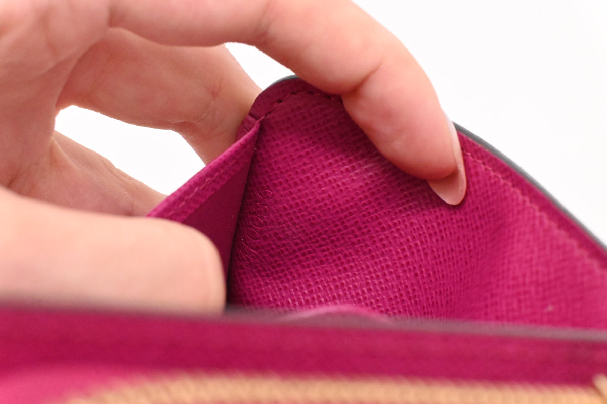 Louis Vuitton Compact Wallet in Fuchsia Perforated Monogram Canvas