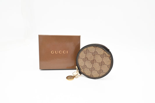 Gucci Round Coin Case in GG Coated Canvas