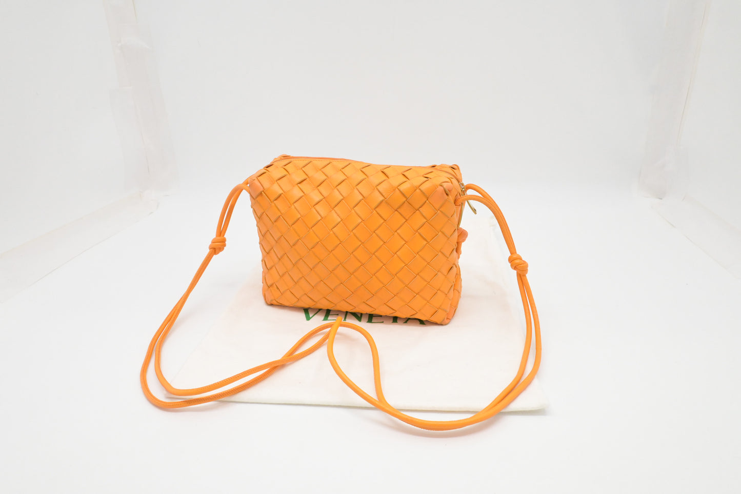Bottega Veneta Loop Camera Bag in Tangerine Intreciatto Leather