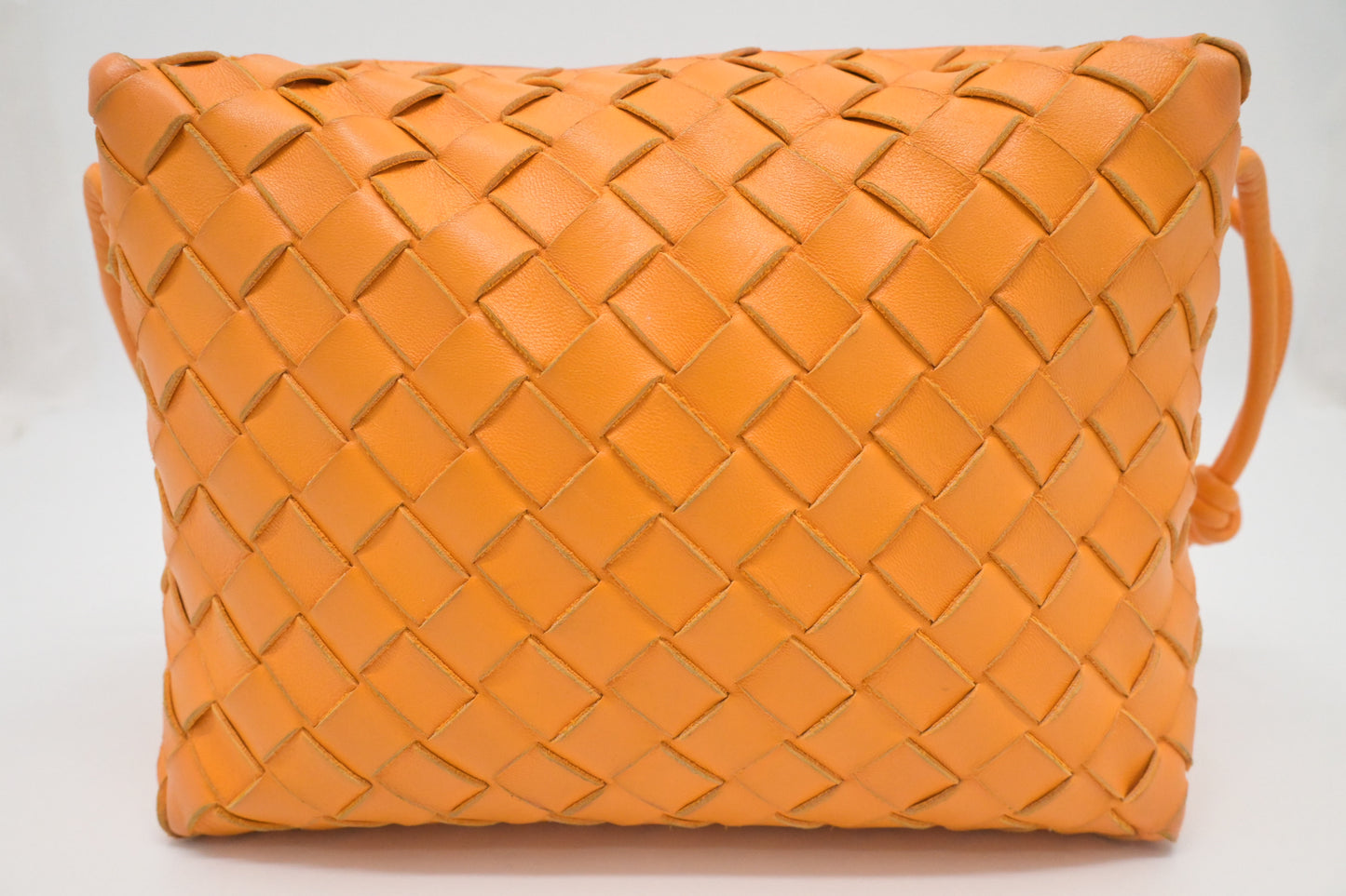 Bottega Veneta Loop Camera Bag in Tangerine Intreciatto Leather