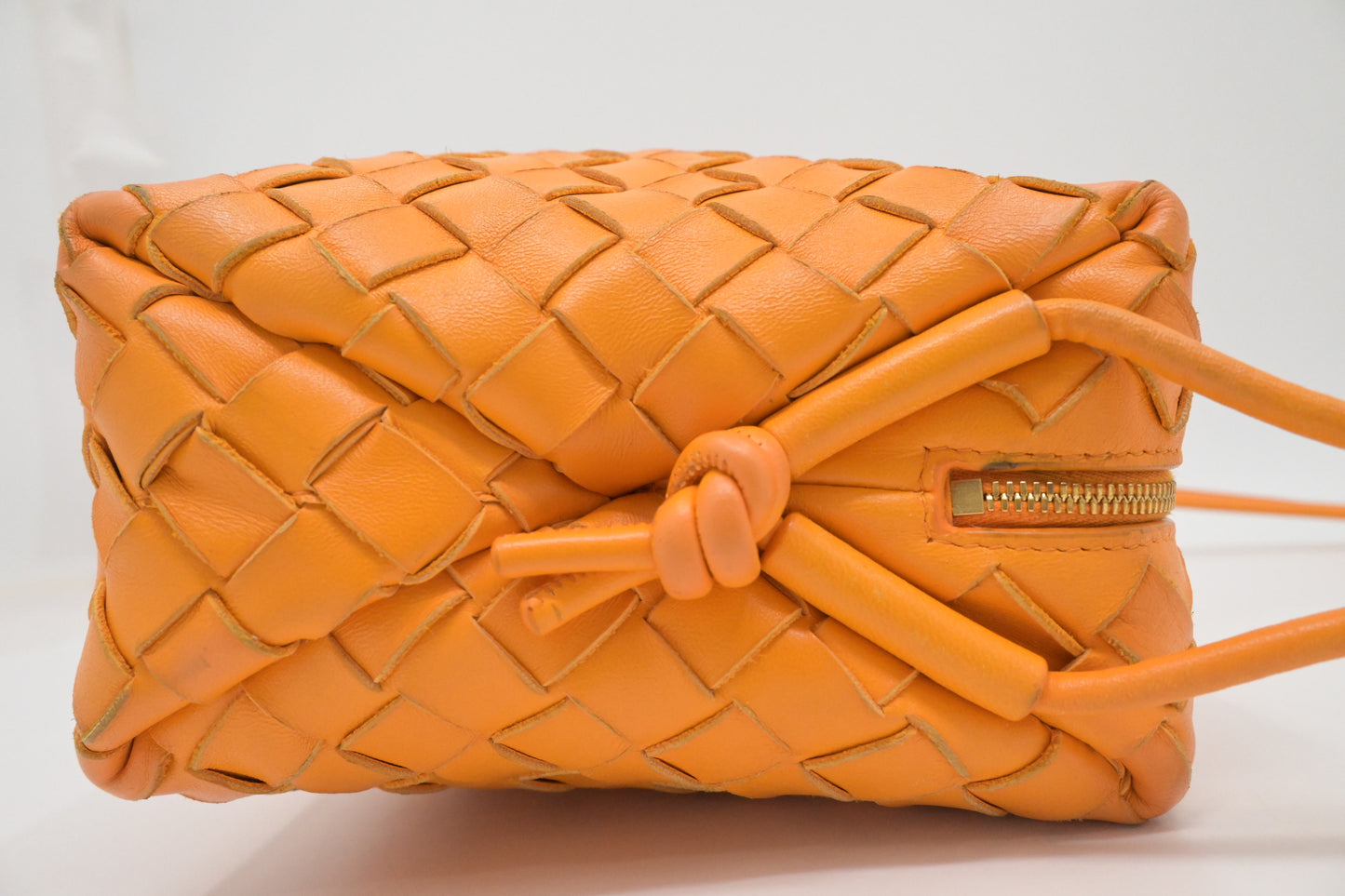Bottega Veneta Loop Camera Bag in Tangerine Intreciatto Leather