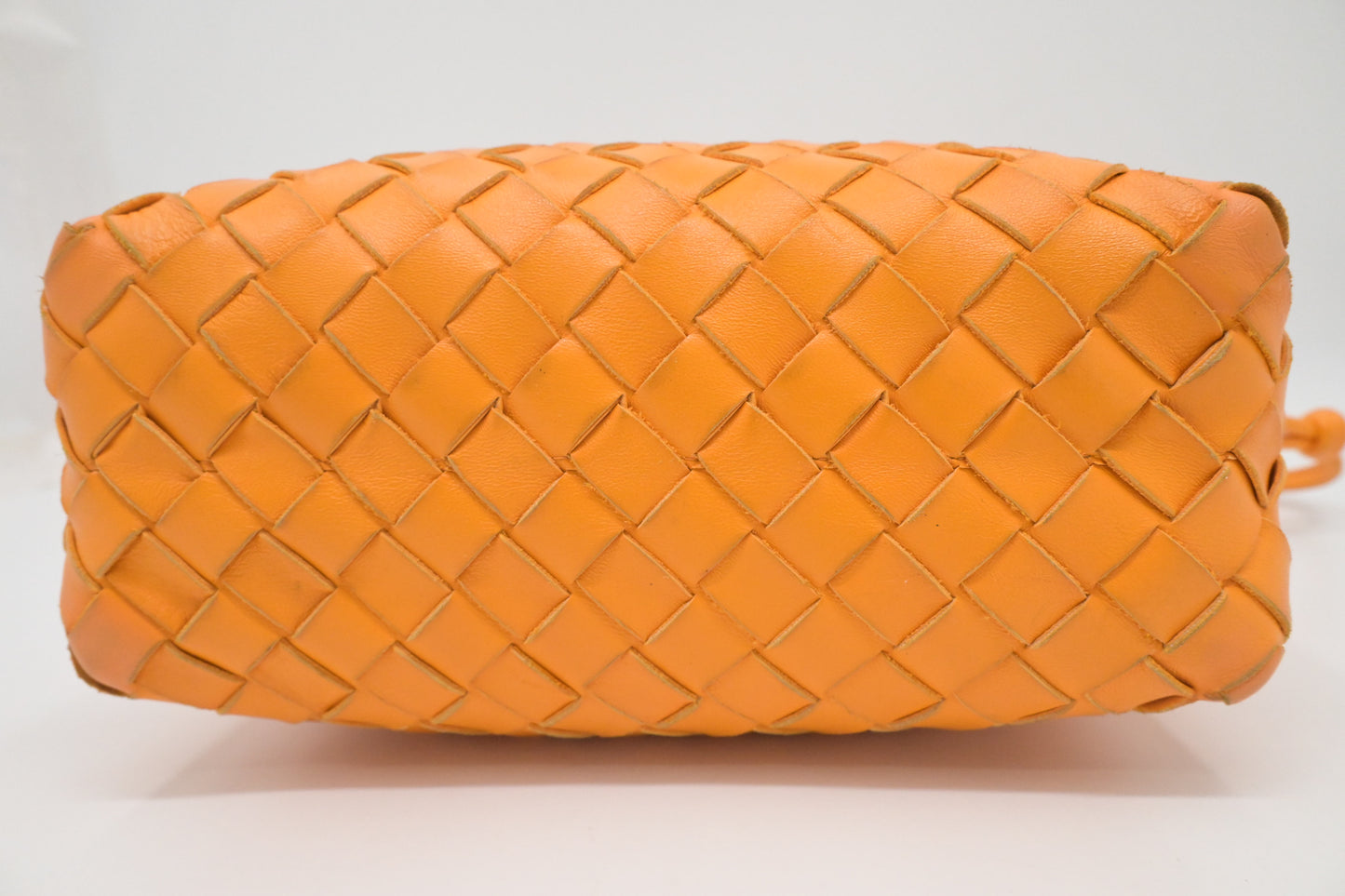 Bottega Veneta Loop Camera Bag in Tangerine Intreciatto Leather