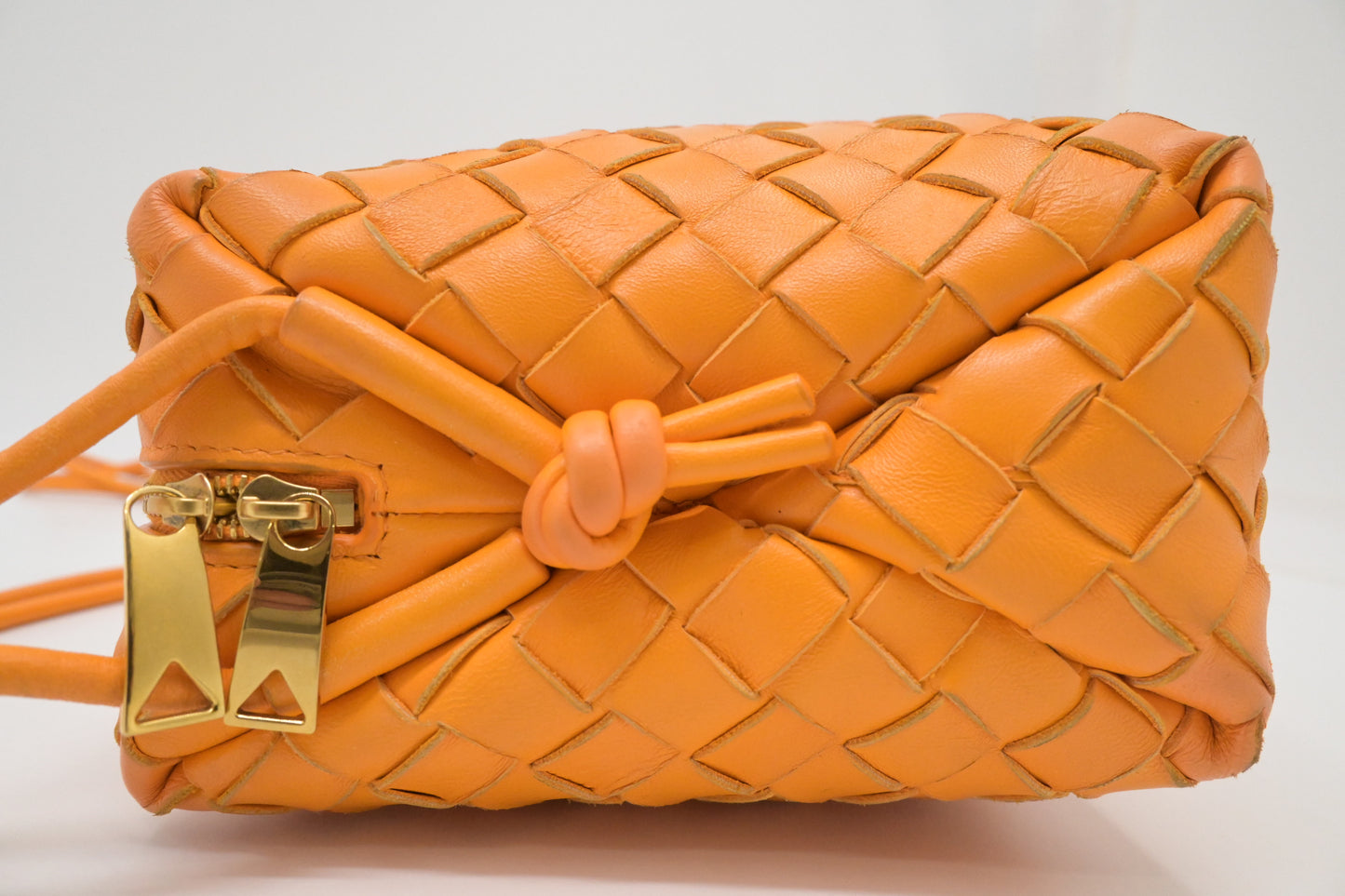 Bottega Veneta Loop Camera Bag in Tangerine Intreciatto Leather