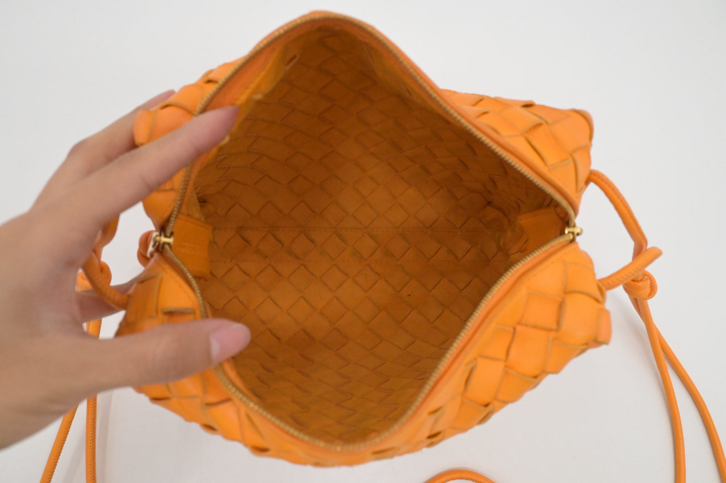 Bottega Veneta Loop Camera Bag in Tangerine Intreciatto Leather
