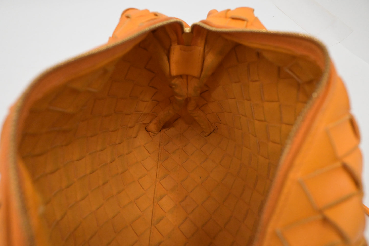 Bottega Veneta Loop Camera Bag in Tangerine Intreciatto Leather