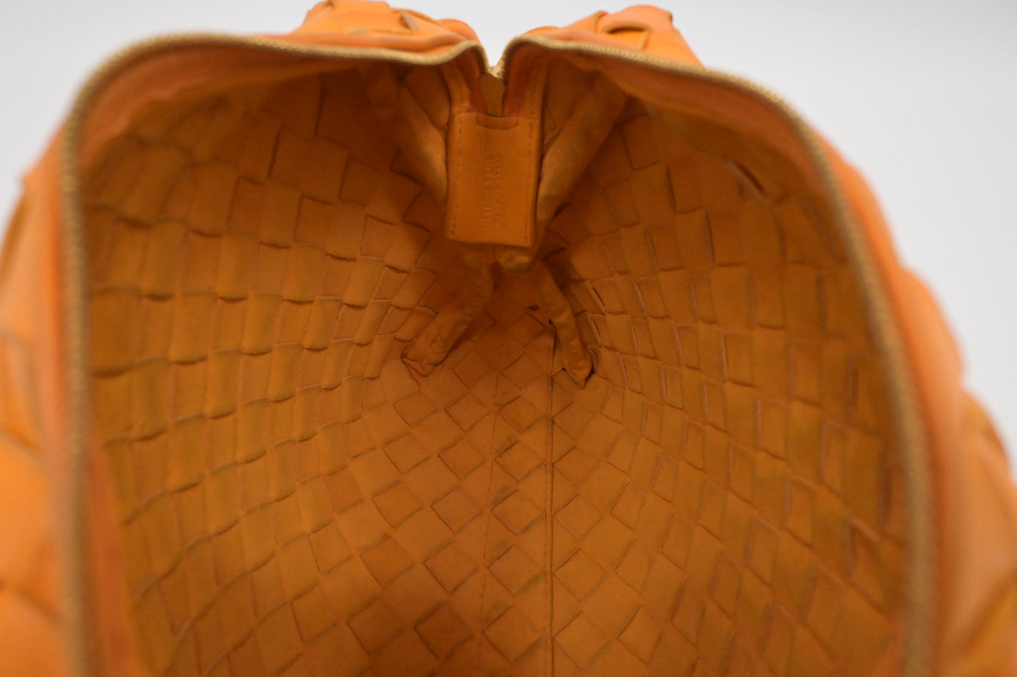 Bottega Veneta Loop Camera Bag in Tangerine Intreciatto Leather