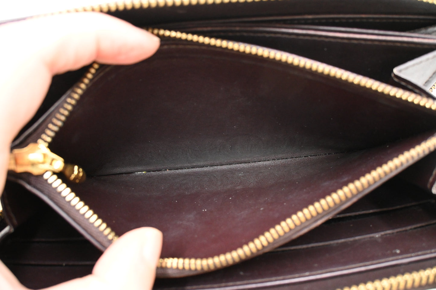Louis Vuitton Long Zippy Wallet in Amarante Vernis Leather