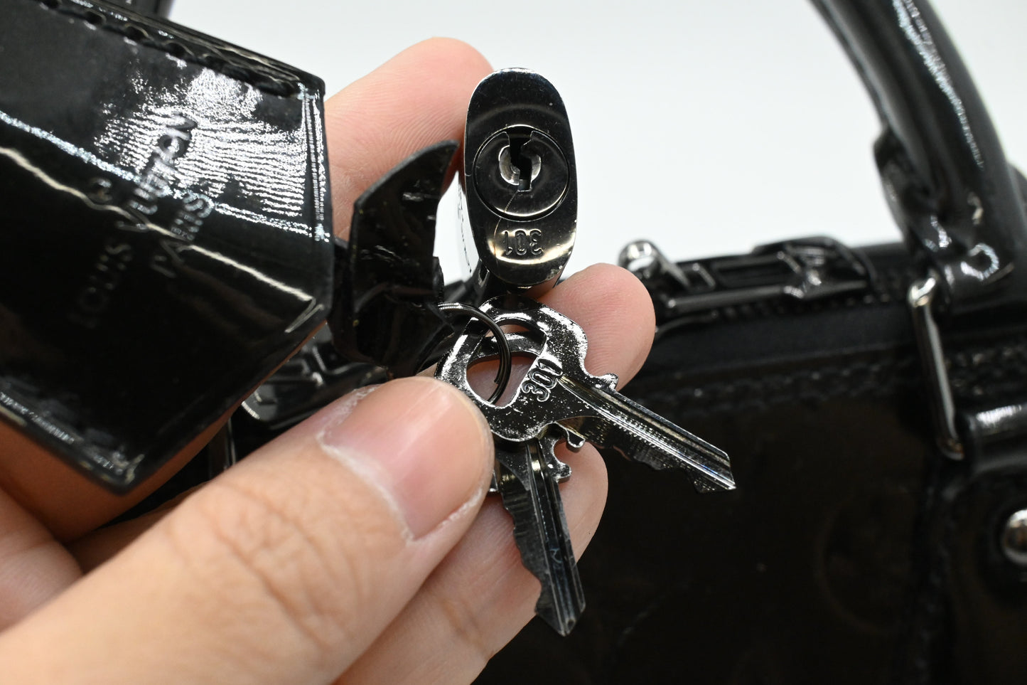 Louis Vuitton Alma in Black Magnetique Vernis Leather