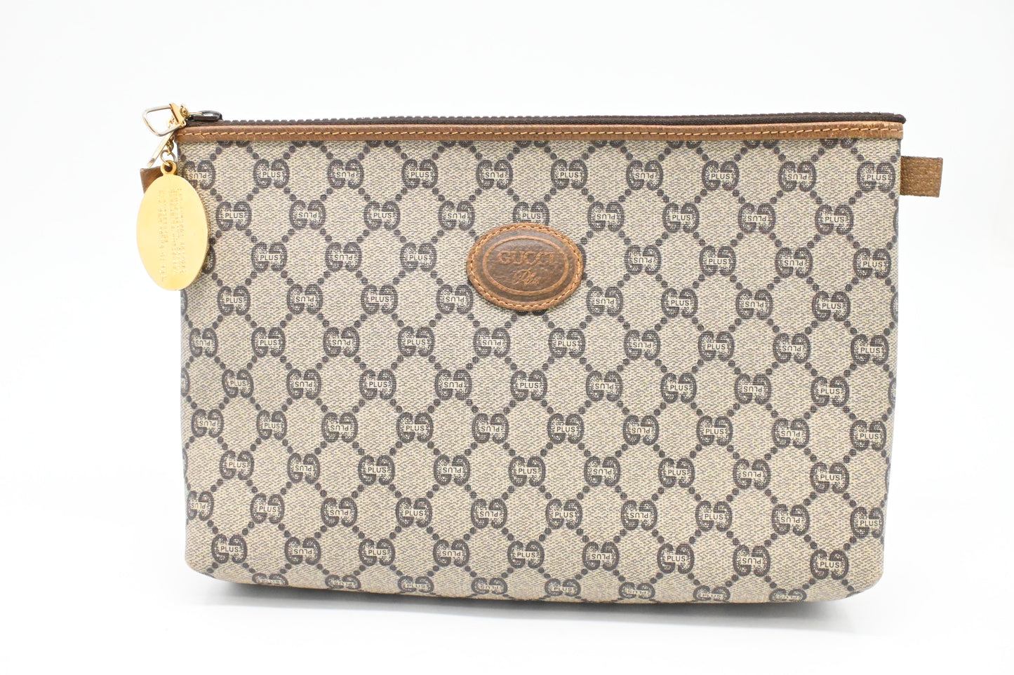 Gucci Plus Clutch in GG Plus Supreme Canvas