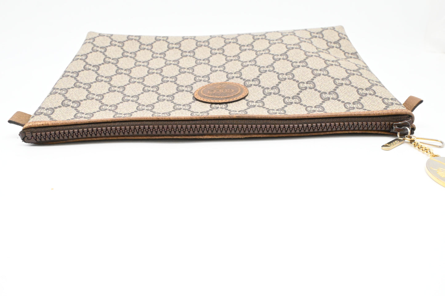 Gucci Plus Clutch in GG Plus Supreme Canvas
