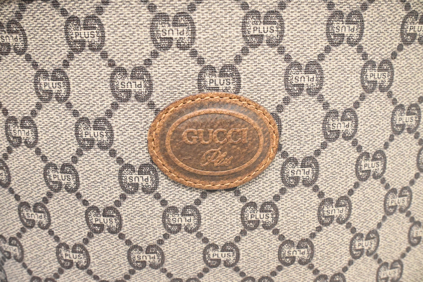Gucci Plus Clutch in GG Plus Supreme Canvas