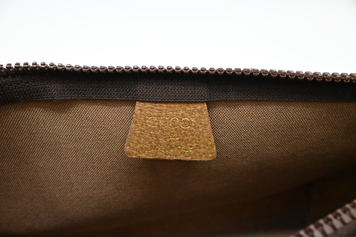 Gucci Plus Clutch in GG Plus Supreme Canvas
