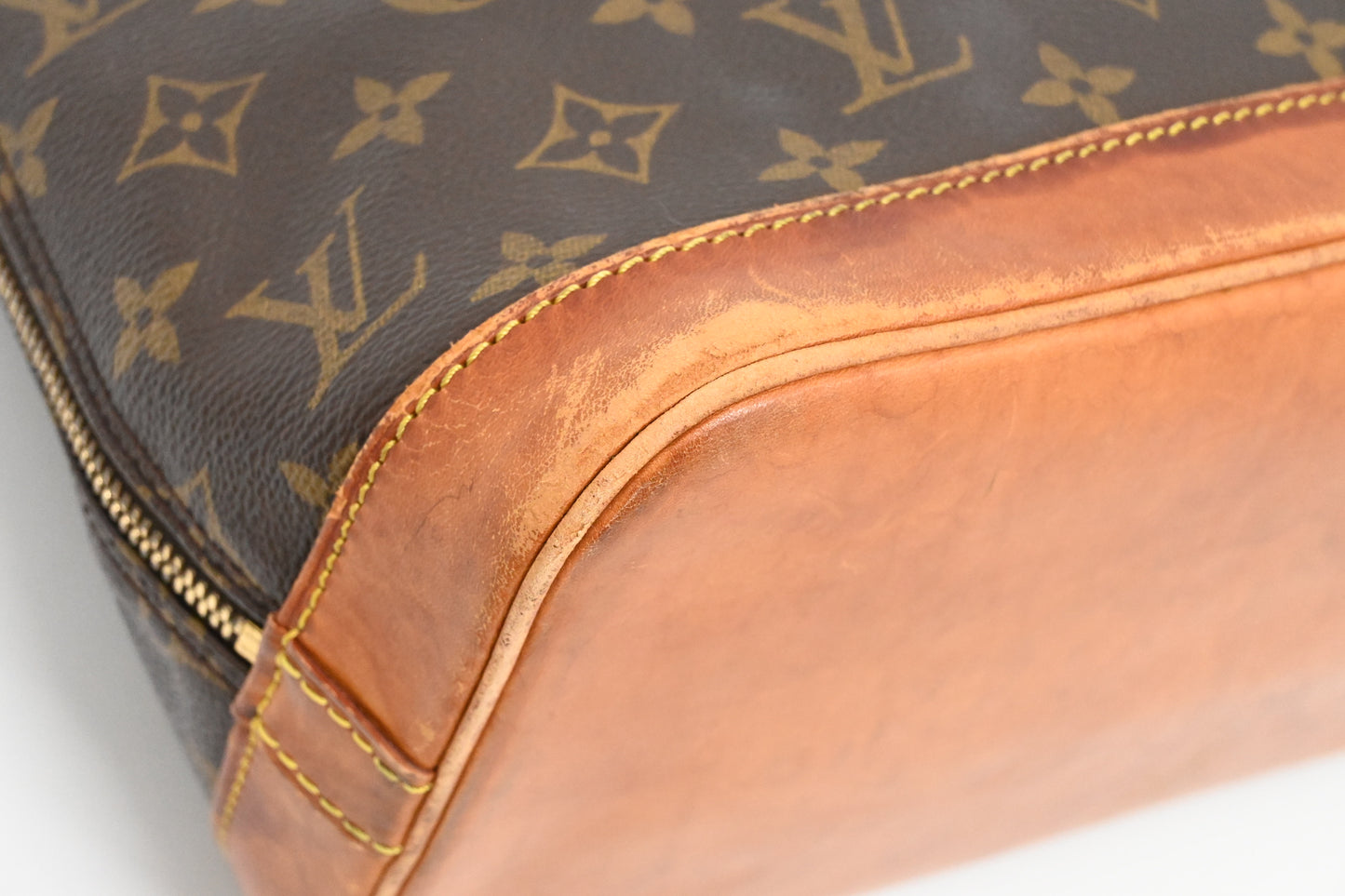 Louis Vuitton Alma PM in Monogram Canvas