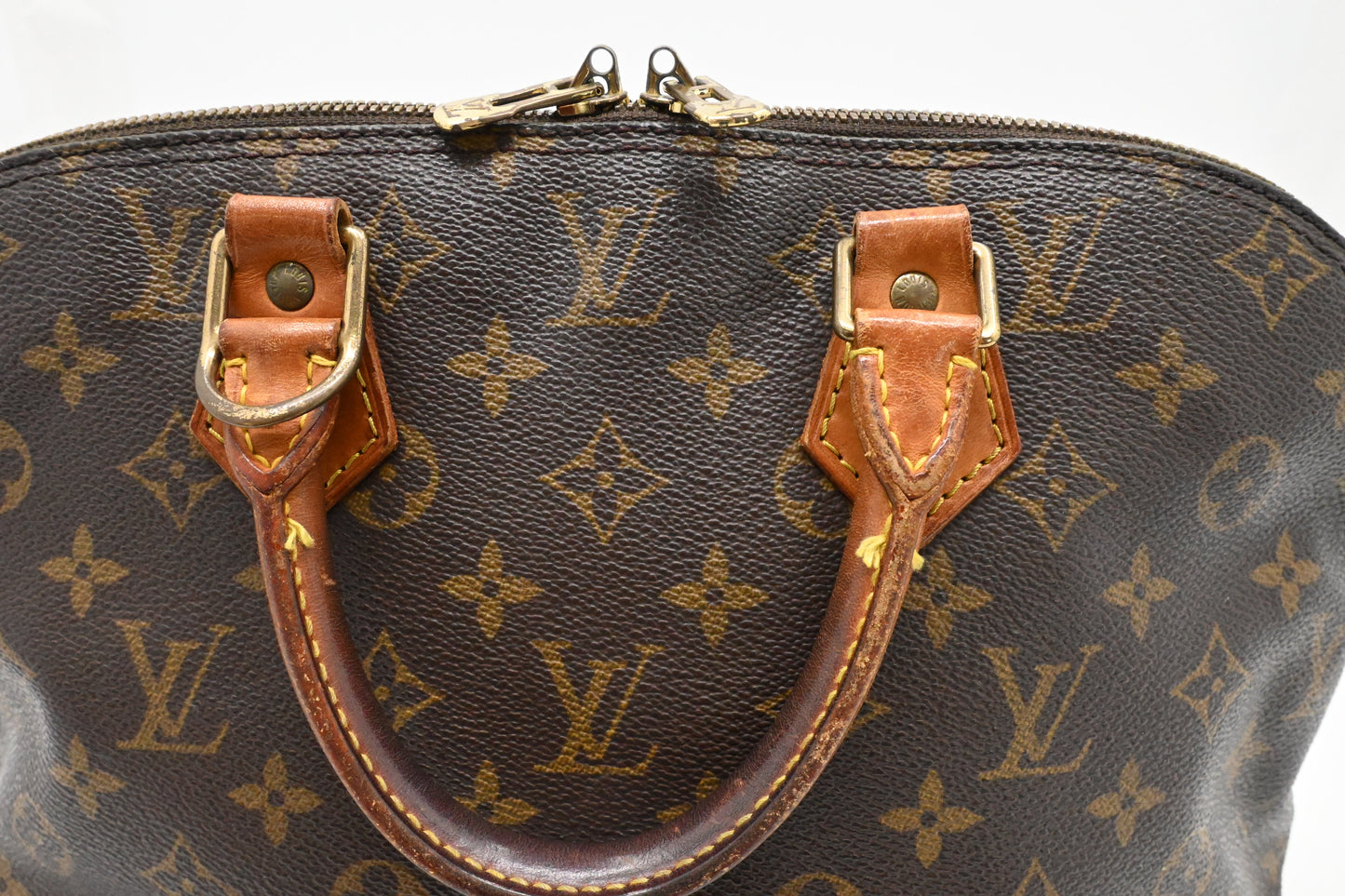 Louis Vuitton Alma PM in Monogram Canvas