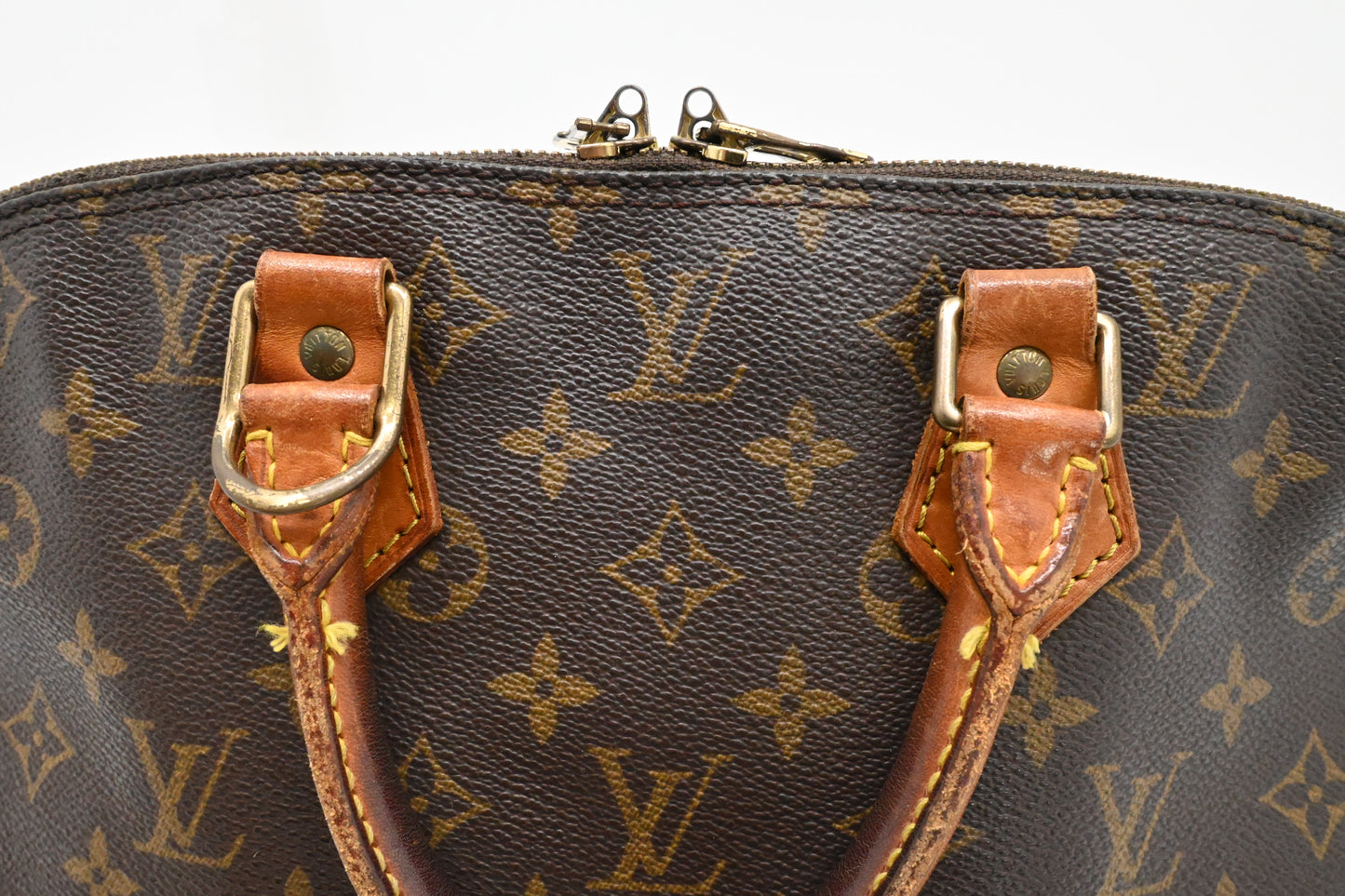 Louis Vuitton Alma PM in Monogram Canvas